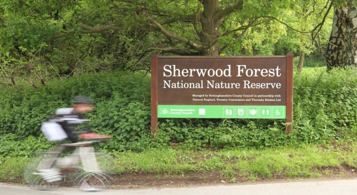 Liam cycling past Sherwood Nature Reserve