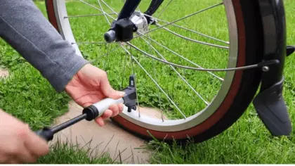 how to pump a bike tire with a hand pump